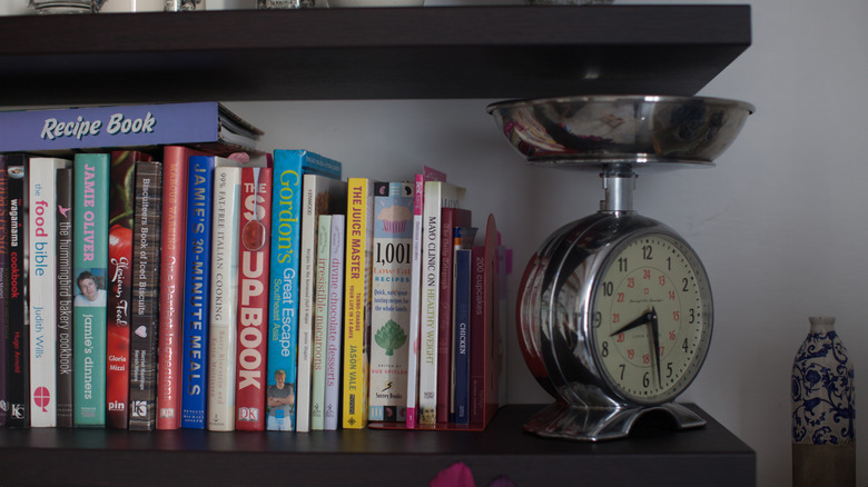 cookbooks stored on shelf