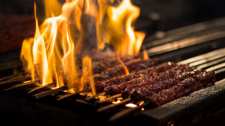 meat burning on grill