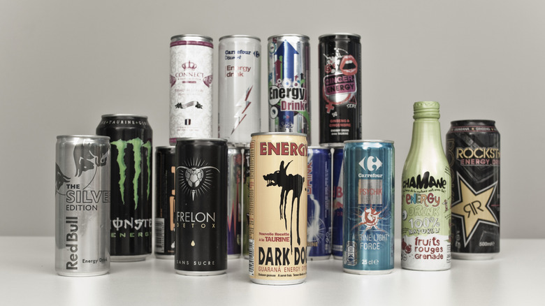 Various cans of energy drinks stacked on each other