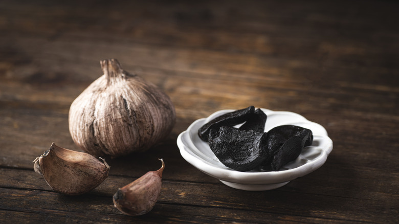 Black garlic on table