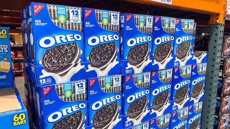Stacks of Oreo cookies on a Costco store shelf.