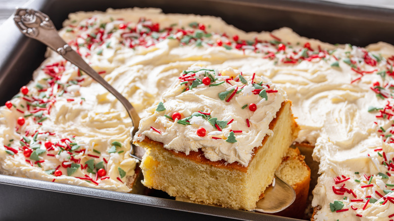 sheet cake with Christmas decorations with server