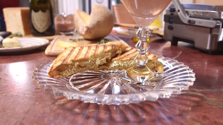 Serendipity 3's grilled cheese sandwich served on a plate.