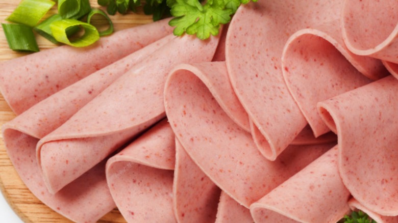 A closeup of thin slices of bologna