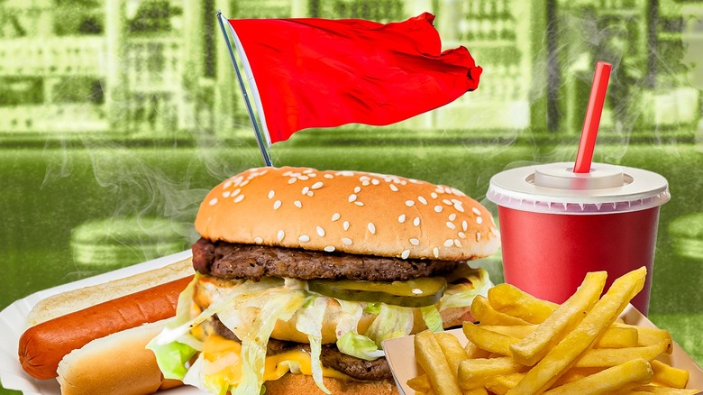 Fast food items in front of a red flag