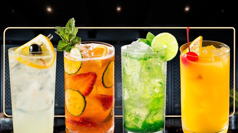 a variety of brightly colored cocktails in a row