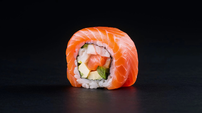 Salmon wrapped sushi roll