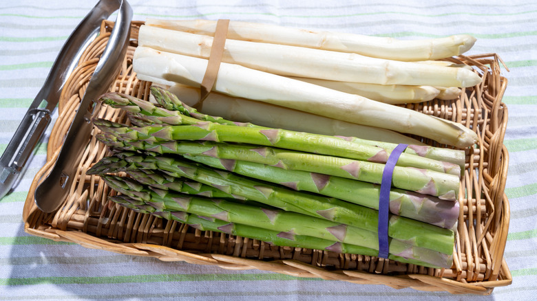bundles of asparagus in a basket