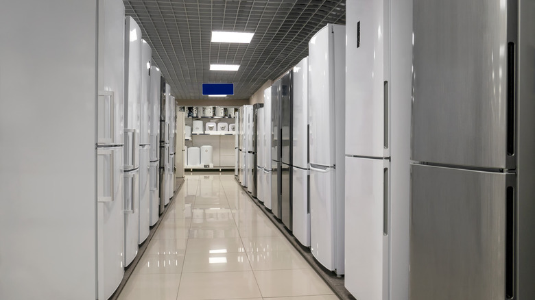 Different refrigerators in a row at store
