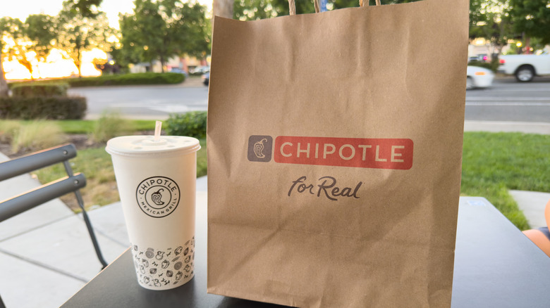 Chipotle paper bag and drink