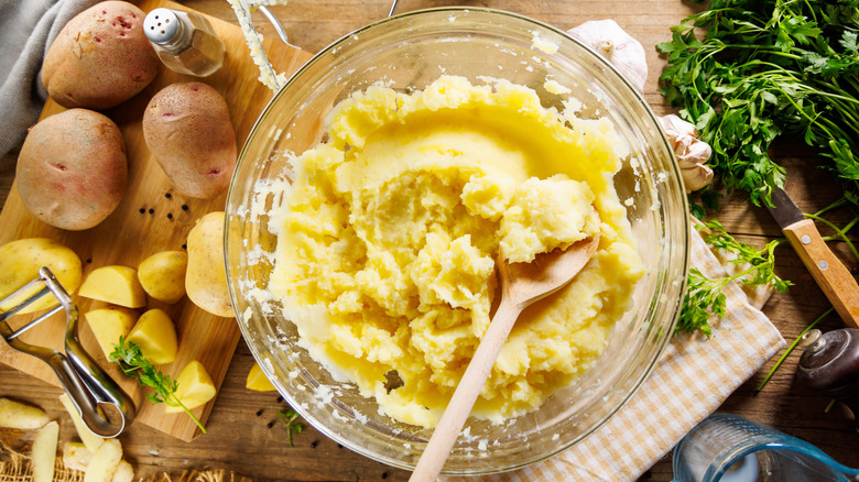 Creamy mashed potatoes in a glass bowl