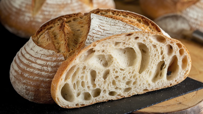 A cross-section of a fresh-baked loaf of sourdough bread.