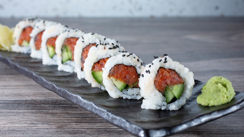 spicy tuna rolls on a slab