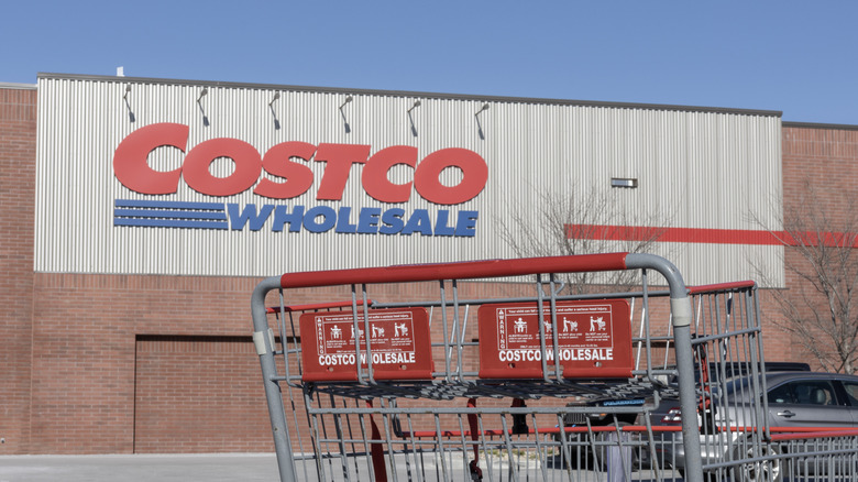 The exterior of Costco Wholesale store with a cart