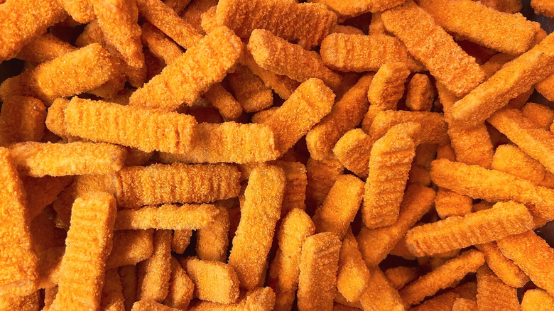 Frozen fish sticks in a pile