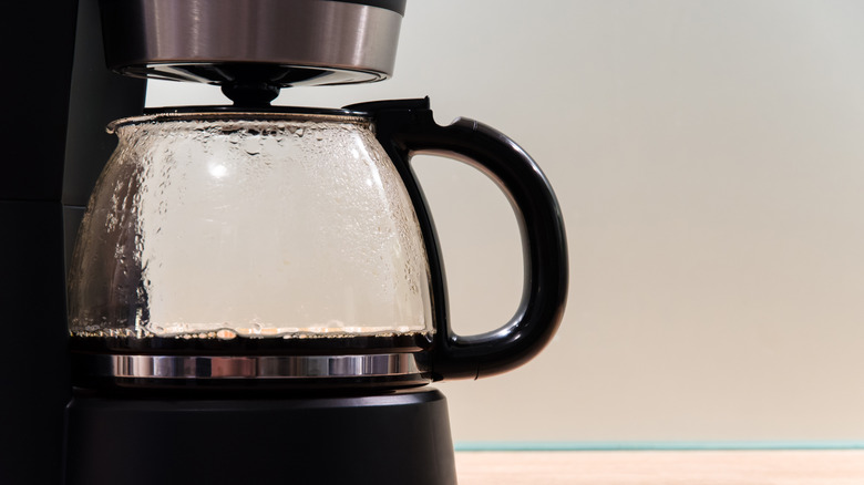 An almost empty coffee pot