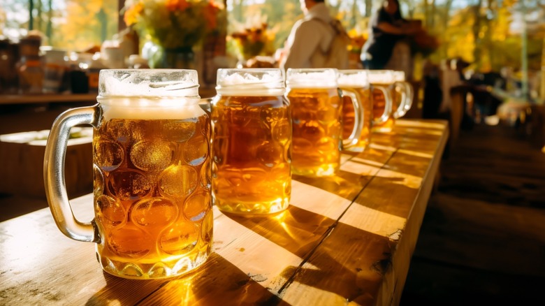 A row of German beers on a wooden table
