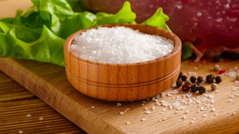 salt cellar displayed on cutting board