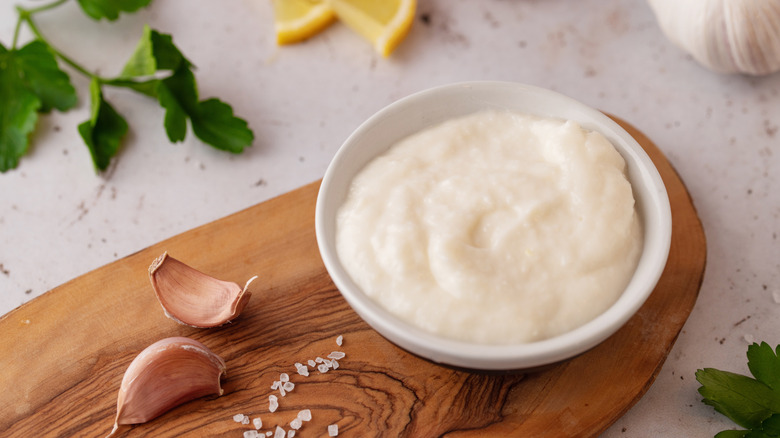 aioli in bowl with garlic, lemon, and salt