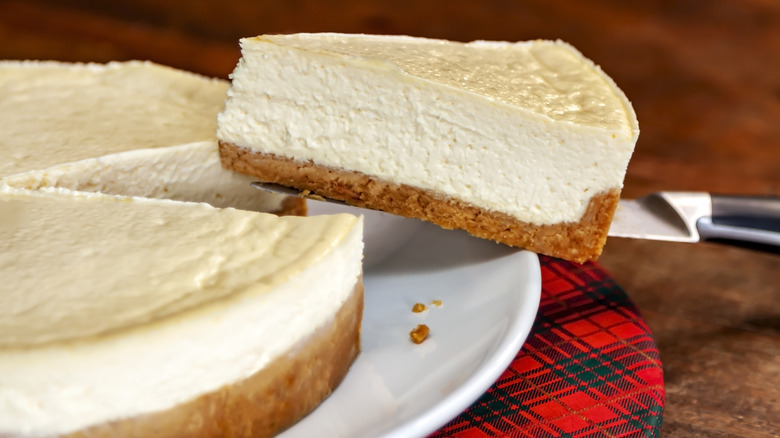 Slice of cheesecake on a pie server