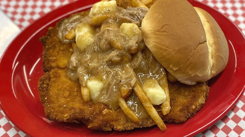 Pork tenderloin sandwich with poutine
