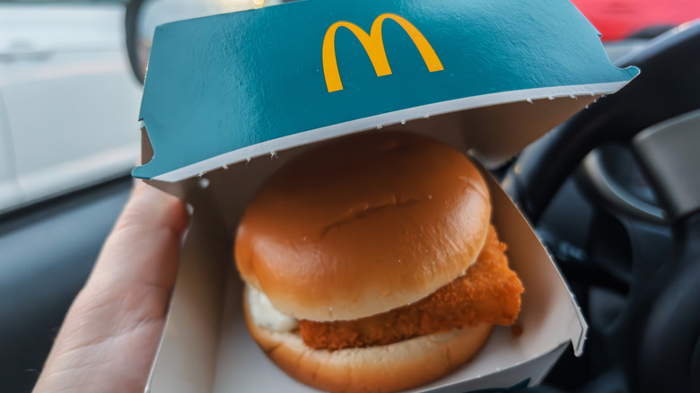 Person holding a McDonald's Filet-O-fish