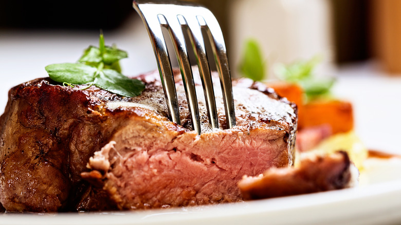 Fork in steak dinner