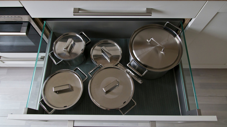 Deep kitchen drawers with pots and pans inside