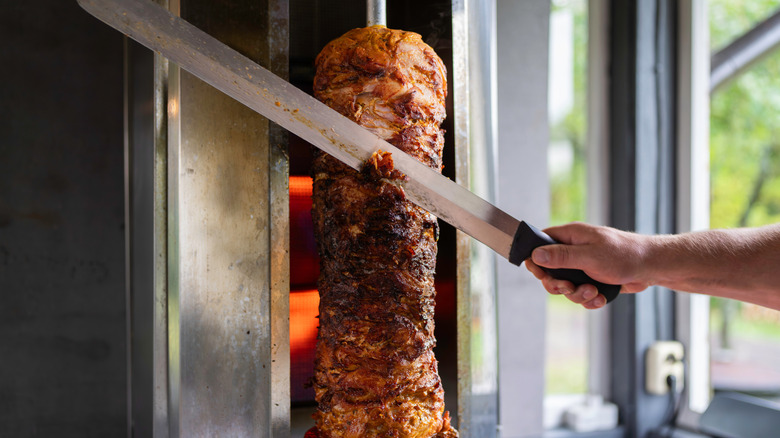 chef slicing doner kebab