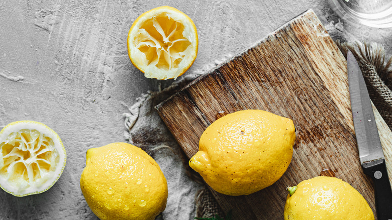 lemons pictured on cutting board