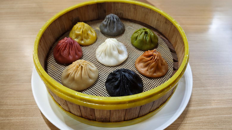 Soup dumplings in a steamer basket
