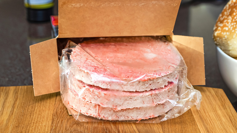 Frozen burger patties in a box