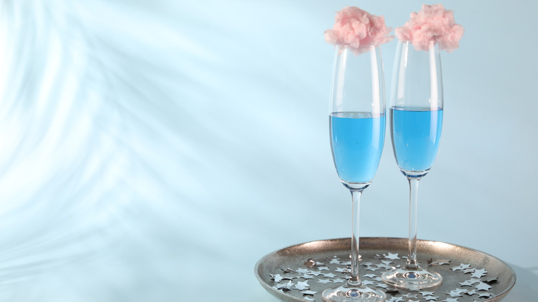 Cotton candy cocktail with cotton candy topper