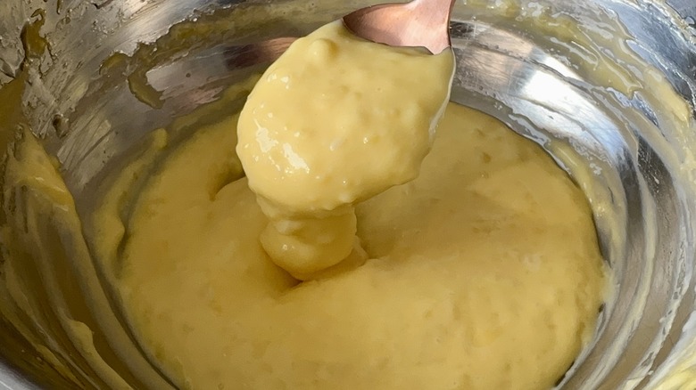 Spoon in bowl of aioli