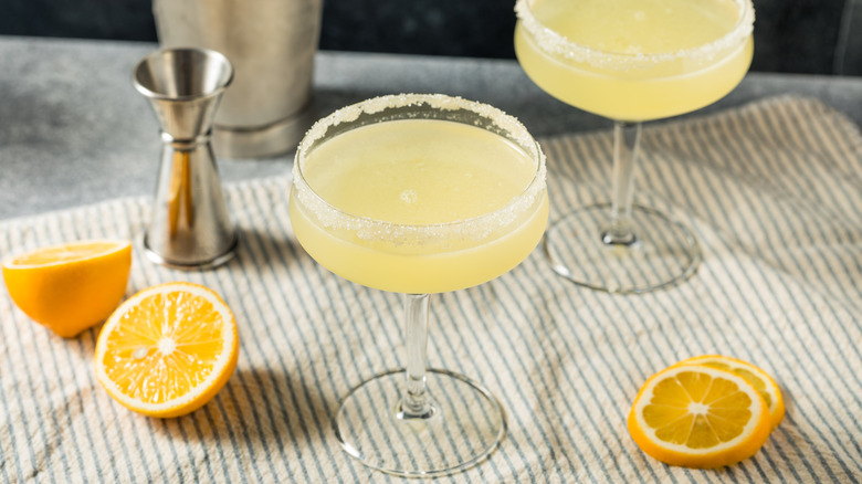 Yellow cocktail in a sugar-rimmed coupe glass