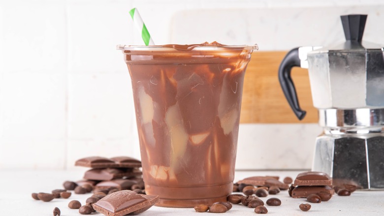 chocolate milk latte with chocolate and espresso maker