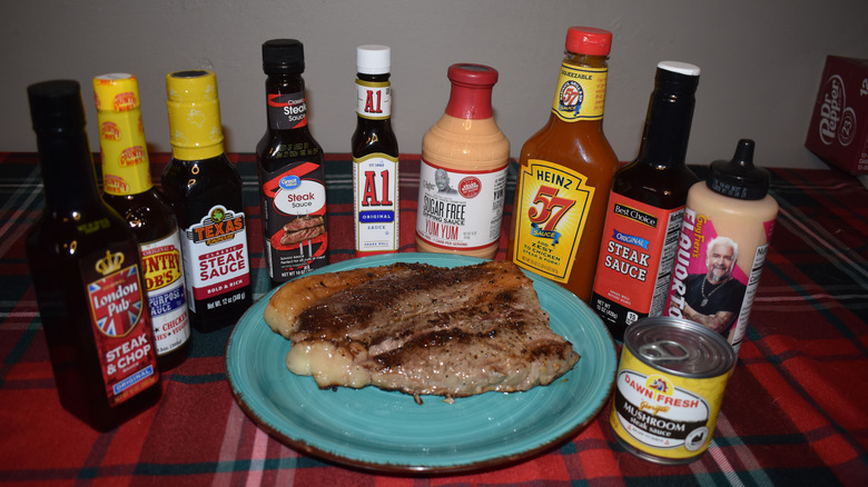 10 bottles of sauce surrounding steak on a plate