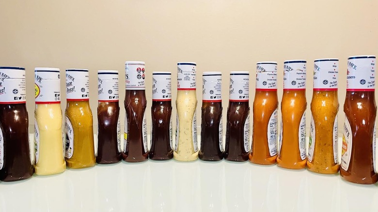 Side view of various Sweet Baby Ray's sauces