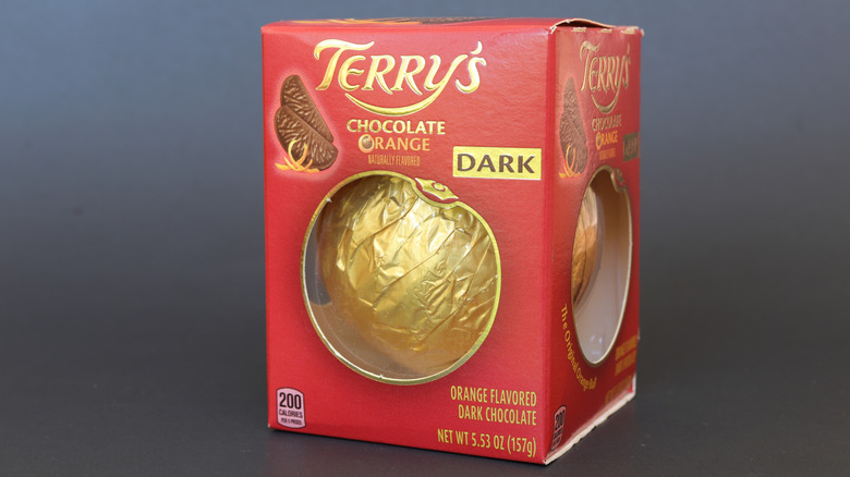 chocolate orange in red box on gray background