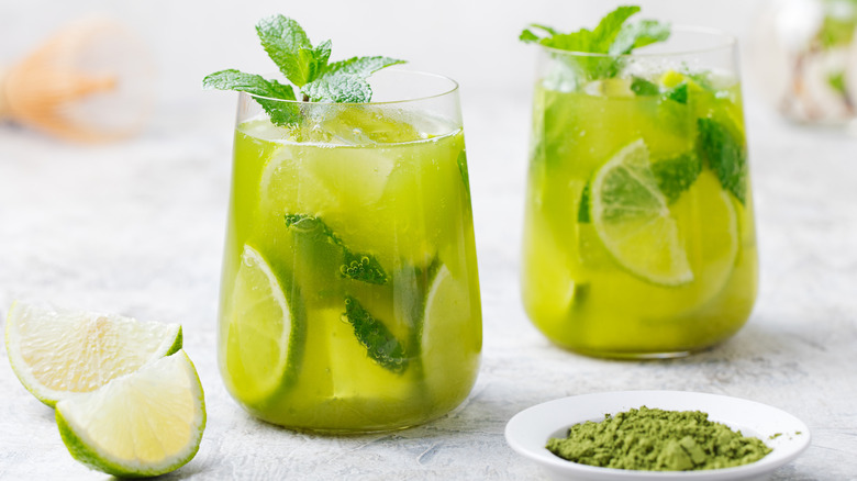Iced green tea cocktail with mint and lime