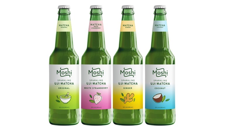 Four glass bottles of Moshi sparkling uji matcha drinks