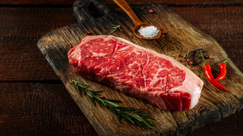 Raw New York strip steak