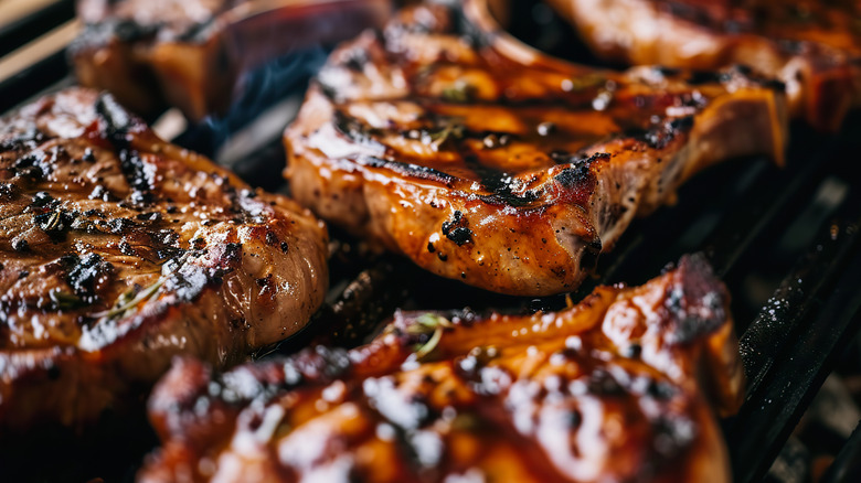 Close up of barbecue pork chops on a hot grill