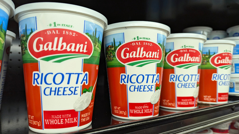 A supermarket shelf with ricotta cheese