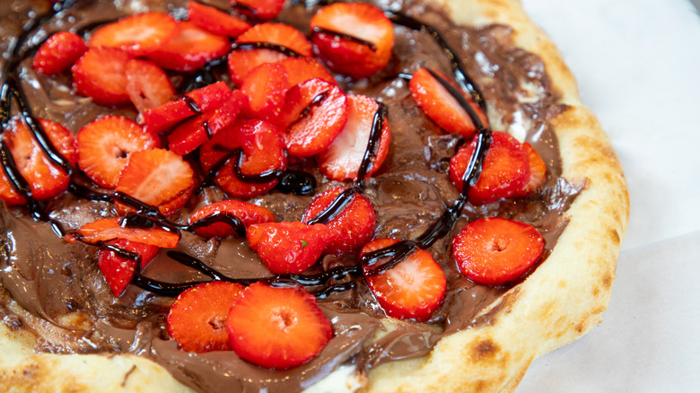 Nutella pizza with freshly cut strawberries