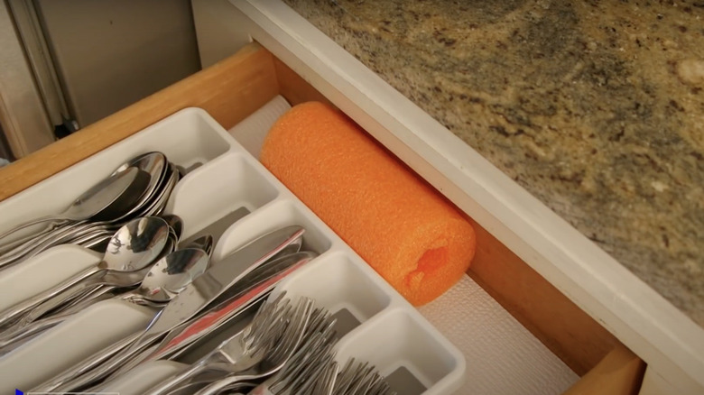 Silverware drawer with pool noodle piece