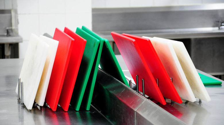 Color coded chopping boards in a kitchen