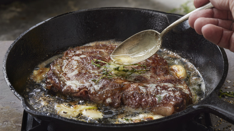 Ribeye steak in a skillet