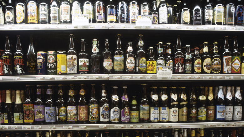 Shelves of beer bottles in a bottle shop