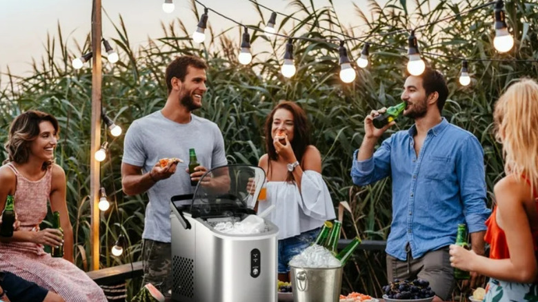 Outdoor party with ice bucket and maker